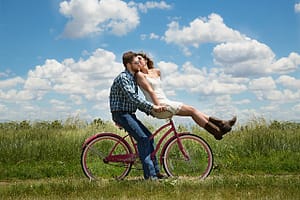 Riding a bike with your partner supports connection, play & physical wellbeing - 3 of the 7 universal needs